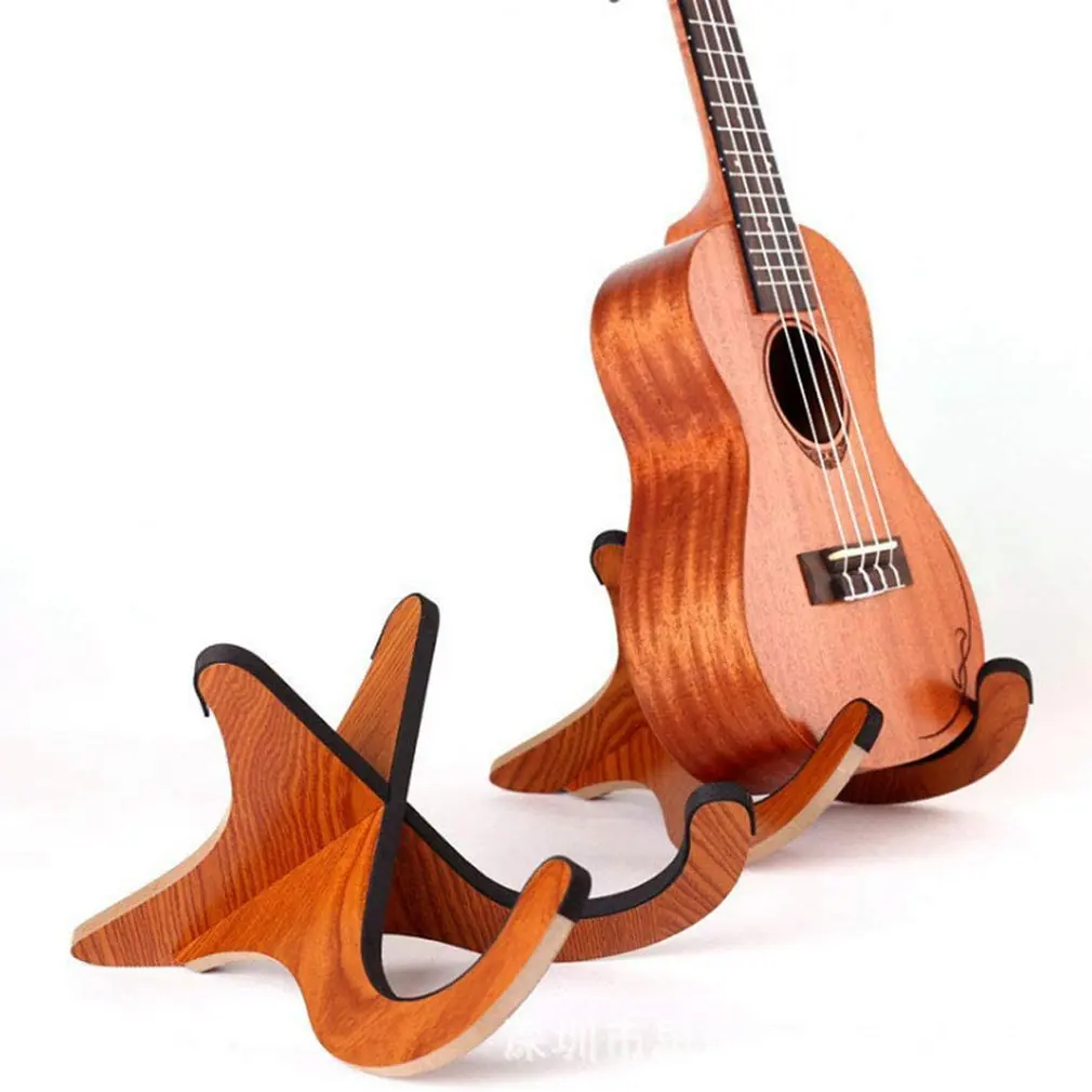 Small Guitar Wood Holder Folding Portable Ukulele Violin Wood Keyboard Stand Vertical Type Guitar Display Stand Instrument Parts
Small Guitar Wood Holder Folding Portable Ukulele Violin Wood Keyboard Stand Vertical Type Guitar Display Stand Instrument Parts