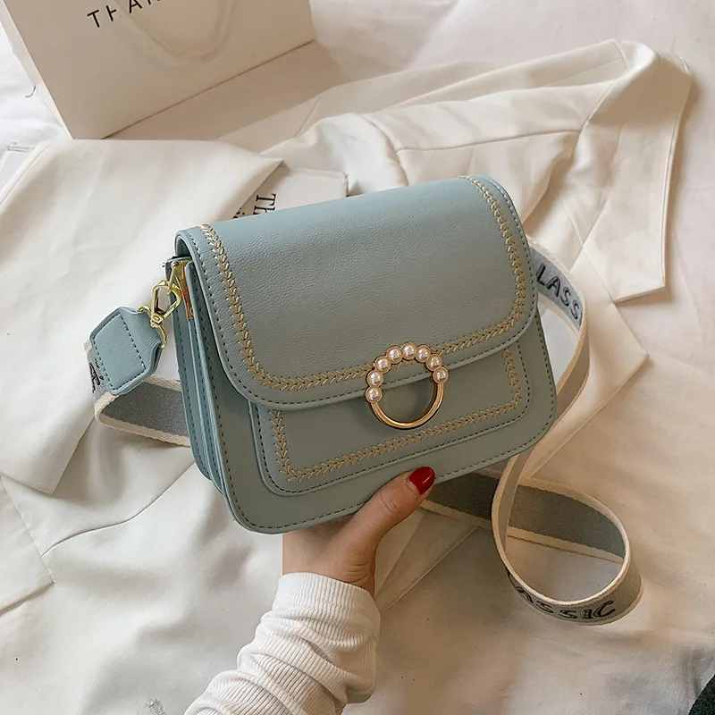 Fashion Lady Embroidery Thread Small Square Bag2021Summer New Style Casual Wide Shoulder Strap Messenger Bag Simple Shoulder Bag 
Fashion Lady Embroidery Thread Small Square Bag2021Summer New Style Casual Wide Shoulder Strap Messenger Bag Simple Shoulder Bag