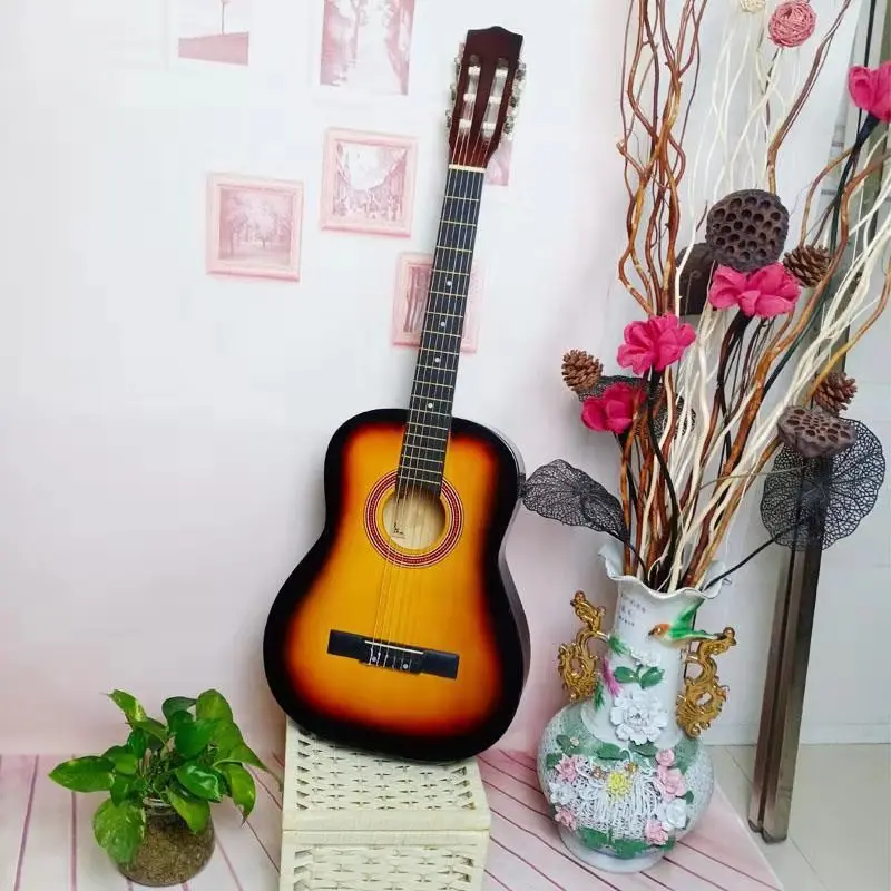 New stylish student classical guitar 30 inch beginner adult acoustic guitar instrument with rounded corners
New stylish student classical guitar 30 inch beginner adult acoustic guitar instrument with rounded corners