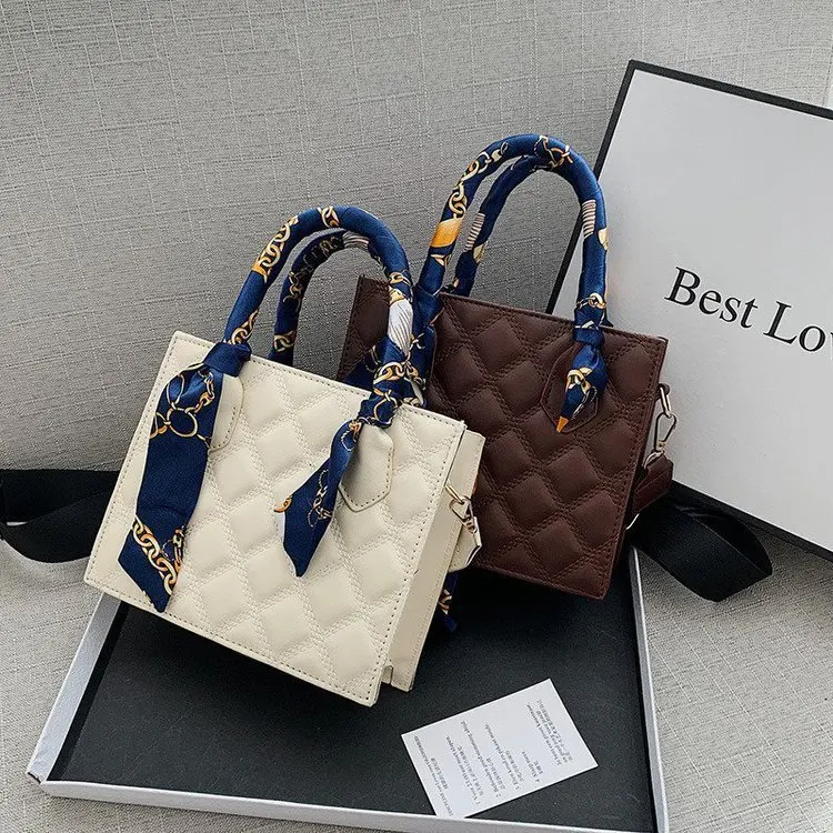 Plaid pattern Ribbon Tote bag 2021 New High-quality PU Leather Women's Designer Handbag High capacity Shoulder Messenger Bag
Plaid pattern Ribbon Tote bag 2021 New High-quality PU Leather Women's Designer Handbag High capacity Shoulder Messenger Bag