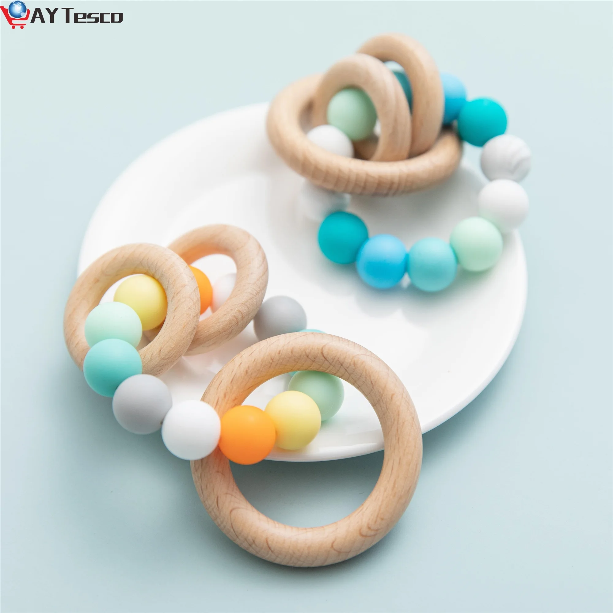 Baby Nursing Bracelets Silicone Teether Teething Wood Rattles Toys Newborn Teeth Care Beads Montessori Bracelets Infant Supplies
Baby Nursing Bracelets Silicone Teether Teething Wood Rattles Toys Newborn Teeth Care Beads Montessori Bracelets Infant Supplies