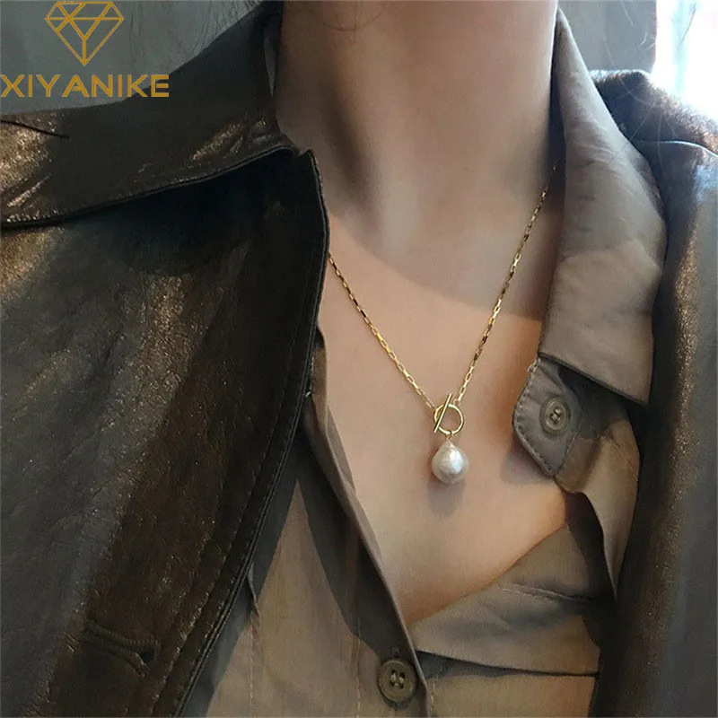 XIYANIKE Silver Color Long Seawater Pearl Necklace Female Fashion OT Buckle Clavicle Chain Golden Niche Design Retro
XIYANIKE Silver Color Long Seawater Pearl Necklace Female Fashion OT Buckle Clavicle Chain Golden Niche Design Retro