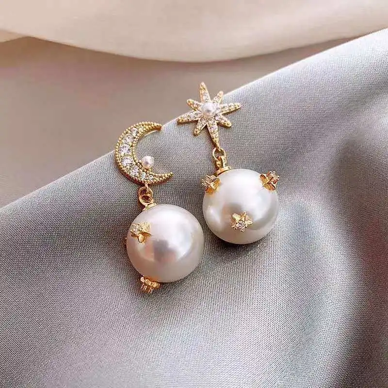 Earrings 2020 new Korean temperament net red star moon pearl asymmetric high sense earrings
Earrings 2020 new Korean temperament net red star moon pearl asymmetric high sense earrings