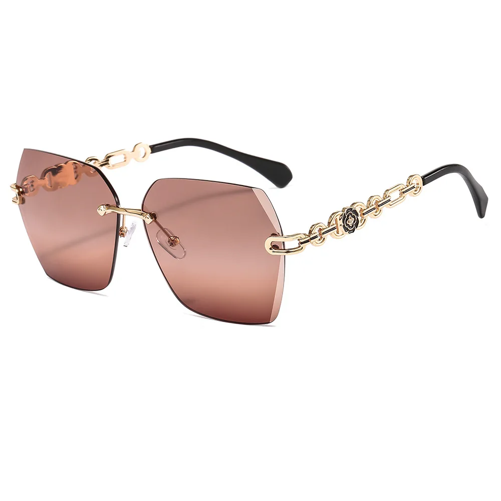 Brand Design Fashion Elegant Flowers Rimless Sunglasses For Women Classic Retro Ladies Summer Party Driving UV400 Sun Glasses
Brand Design Fashion Elegant Flowers Rimless Sunglasses For Women Classic Retro Ladies Summer Party Driving UV400 Sun Glasses