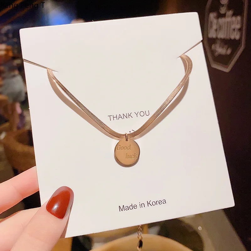 2021 Retro net red temperament titanium steel letter necklace Round brand clavicle chain East fashion trend Pendant
2021 Retro net red temperament titanium steel letter necklace Round brand clavicle chain East fashion trend Pendant