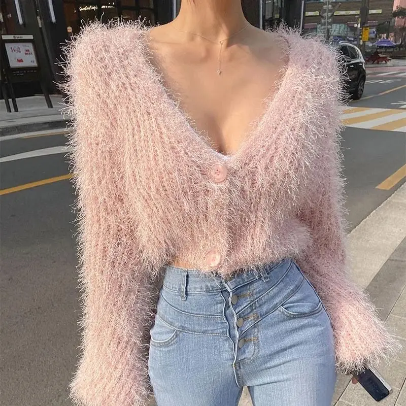 Autumn sweet and sexy V-neck mohair pink knitted sweater short women's cardigan winter fashion all-match Korean base top
Autumn sweet and sexy V-neck mohair pink knitted sweater short women's cardigan winter fashion all-match Korean base top