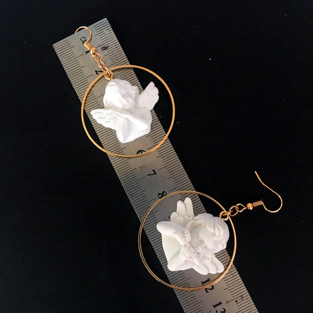 Fashion Cute Cupid Angel Pendant Drop Earring Vintage Angel Drop Earrings Punk Jewelry For Cool Women Girl Friendship Gifts
Fashion Cute Cupid Angel Pendant Drop Earring Vintage Angel Drop Earrings Punk Jewelry For Cool Women Girl Friendship Gifts