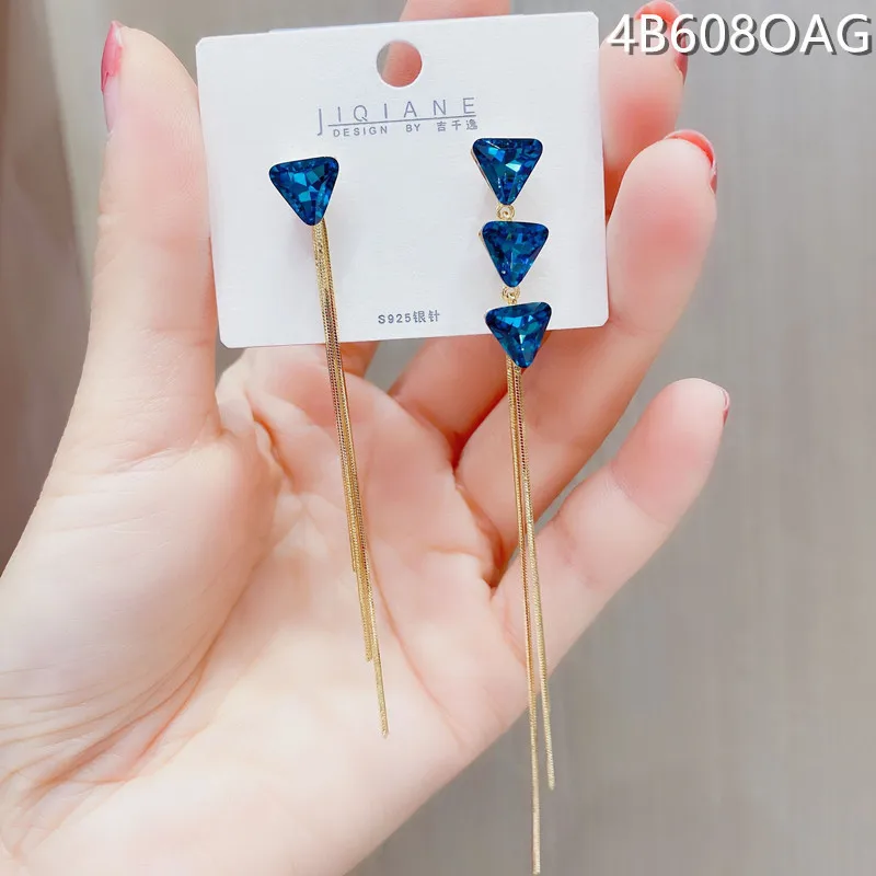 Dark blue triangle crystal long female net red tassel new trendy asymmetric earrings
Dark blue triangle crystal long female net red tassel new trendy asymmetric earrings