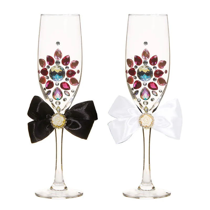 1 Pair Luxury Wedding Party Rhinestone Champagne Glass Red Wine Ribbon Bow Bride and Groom Goblet Creative Wedding Gifts
1 Pair Luxury Wedding Party Rhinestone Champagne Glass Red Wine Ribbon Bow Bride and Groom Goblet Creative Wedding Gifts