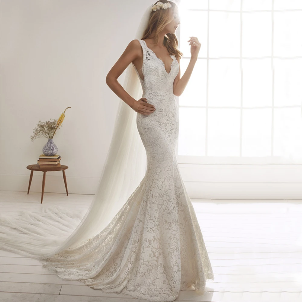 Exquisite V-Neck Mermaid Wedding Dresses Sleeveless A-Line Sexy Lace Appliques Court Train Button Bridal Gowns Vestidos De Novia
Exquisite V-Neck Mermaid Wedding Dresses Sleeveless A-Line Sexy Lace Appliques Court Train Button Bridal Gowns Vestidos De Novia