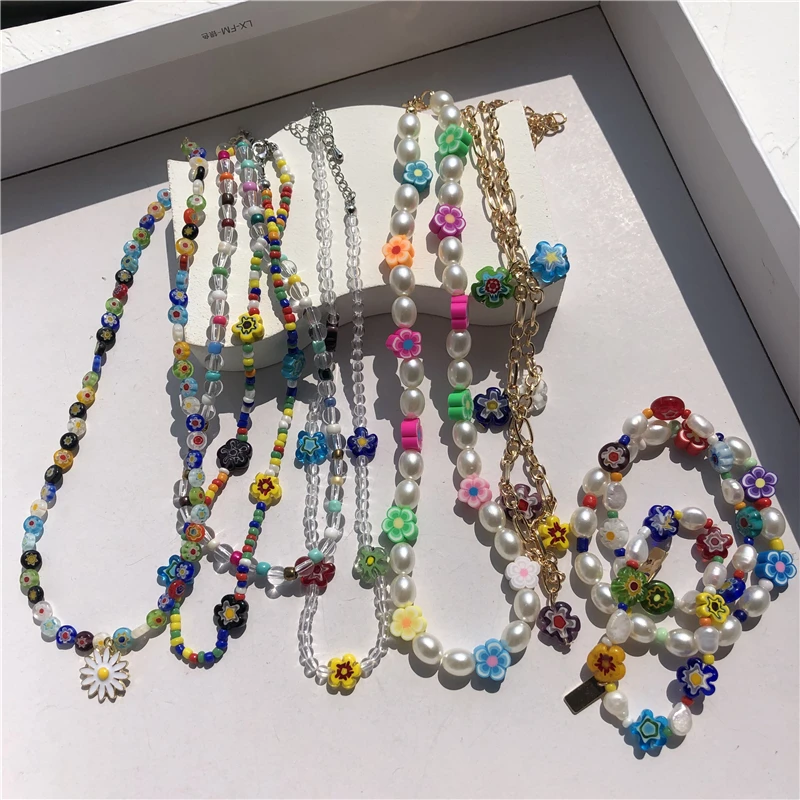 nouveau Transparent acrylique perles rondes fleurs pendentif Daisy collier pour femmes homme vacances Couple bijoux
nouveau Transparent acrylique perles rondes fleurs pendentif Daisy collier pour femmes homme vacances Couple bijoux