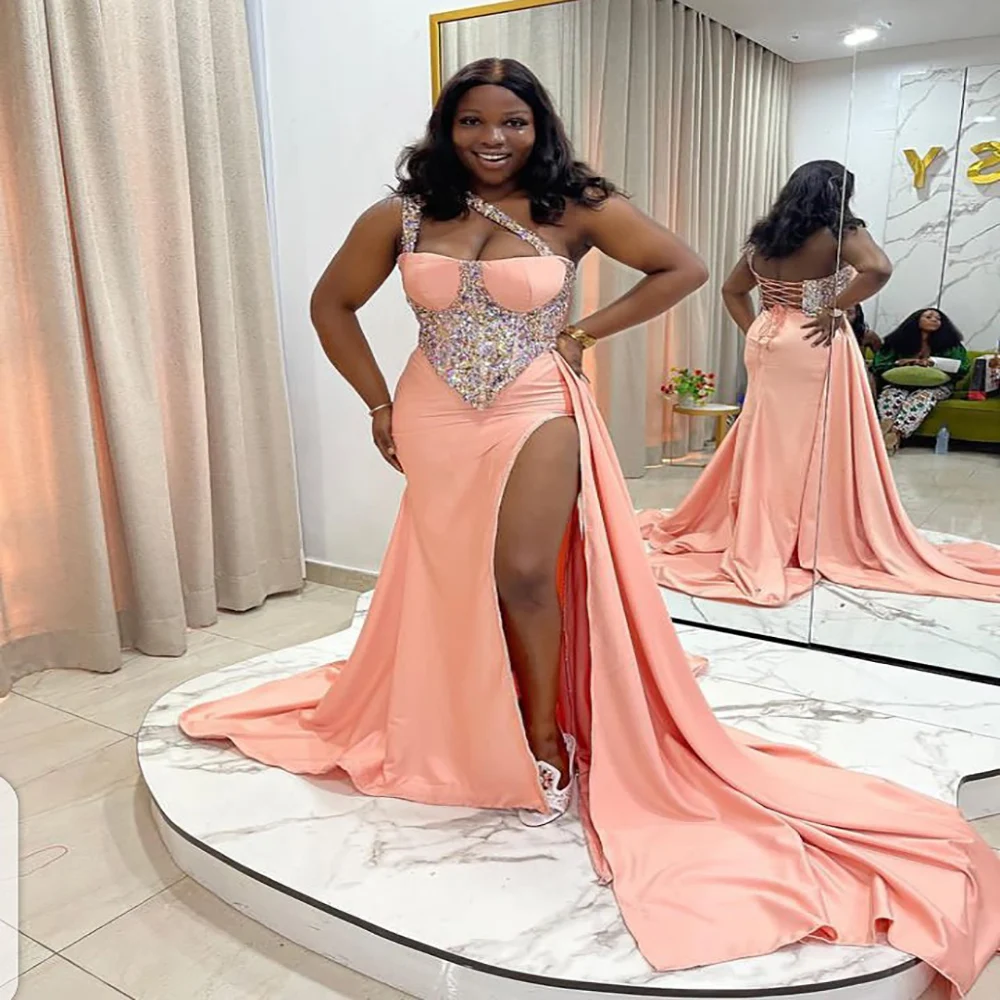 Plus Size One Shoulder Prom Dress For Black Girls Peach Crystal Beaded Mermaid Evening Gown With Slit Elegant Women Party Wear
Plus Size One Shoulder Prom Dress For Black Girls Peach Crystal Beaded Mermaid Evening Gown With Slit Elegant Women Party Wear