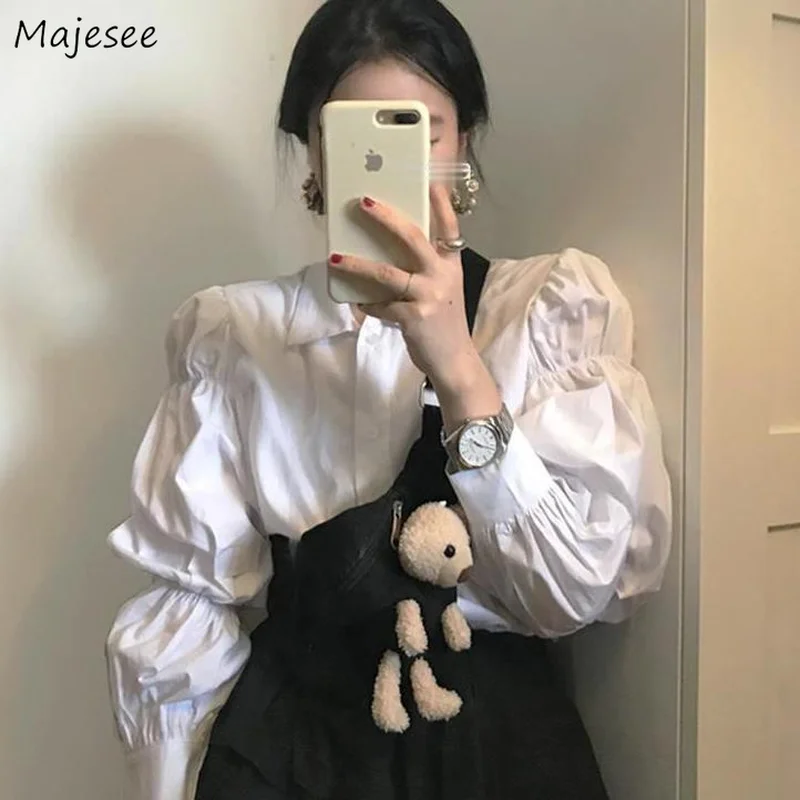 Shirts Women Solid Puff Sleeve Single Breasted French Style Retro Vintage Princess Loose Leisure New Arrival Tops Sweet Girls
Shirts Women Solid Puff Sleeve Single Breasted French Style Retro Vintage Princess Loose Leisure New Arrival Tops Sweet Girls