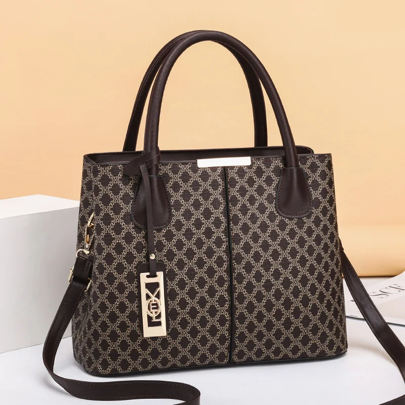 New 2022 Fashion Women Handbags Tassel PU Leather Totes Bag Top-handle Embroidery Bag Shoulder Bag Lady Simple Style
New 2022 Fashion Women Handbags Tassel PU Leather Totes Bag Top-handle Embroidery Bag Shoulder Bag Lady Simple Style