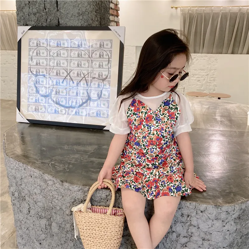 Lady Style Puff Short Sleeved Kids Round Neck Tops with Sling Dress Summer Girl Floral Sling Two-piece Dresses Suit Cloth
Lady Style Puff Short Sleeved Kids Round Neck Tops with Sling Dress Summer Girl Floral Sling Two-piece Dresses Suit Cloth