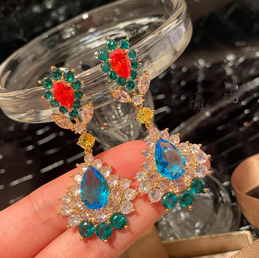 Luxury colored gems fan-shaped earrings crystal long banquet dress retro French vintage baroque drop-shaped women charm jewelry
Luxury colored gems fan-shaped earrings crystal long banquet dress retro French vintage baroque drop-shaped women charm jewelry