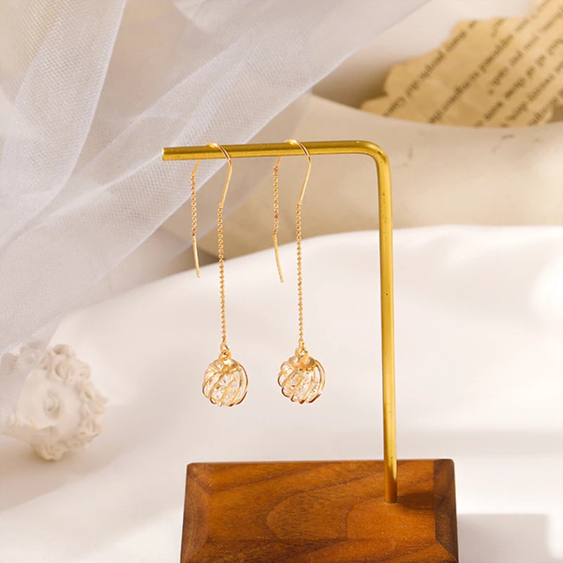 Fashionable And Delicate Hollow-Out Ball Tassel Earrings Feminine Temperament Elegant Romantic Charm Holiday Gifts
Fashionable And Delicate Hollow-Out Ball Tassel Earrings Feminine Temperament Elegant Romantic Charm Holiday Gifts