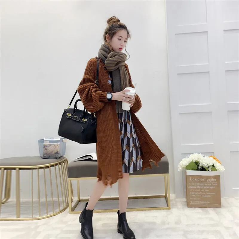 Autumn Long Loose Sweater Cardigan Women's Autumn New Fashion Students Wild Autumn And Winter Thick Sweater Coat
Autumn Long Loose Sweater Cardigan Women's Autumn New Fashion Students Wild Autumn And Winter Thick Sweater Coat