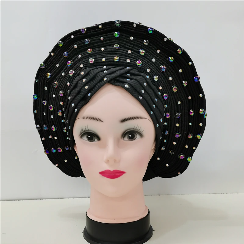 Новый головной убор Gele с бусинами, нигерийский головной убор Aso Oke Gele высокого качества, головной убор Gele, Африканский тюрбан
Новый головной убор Gele с бусинами, нигерийский головной убор Aso Oke Gele высокого качества, головной убор Gele, Африканский тюрбан