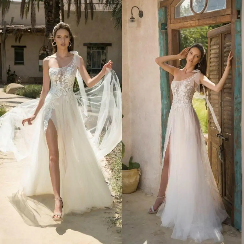 High Slit Wedding Dresses Boho One Shoulder Lace Appliques Beach Wedding Dress Bohemian A Line Bridal Gowns Vestidos De Novia
High Slit Wedding Dresses Boho One Shoulder Lace Appliques Beach Wedding Dress Bohemian A Line Bridal Gowns Vestidos De Novia