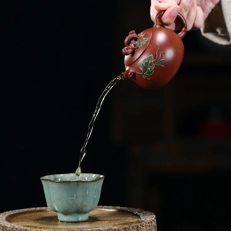 Yixing Ore Dahongpao Purple Sand Pot Handmade Squirrel Grape Teapot 150 Ml Sketch Xishi Pot 
Yixing Ore Dahongpao Purple Sand Pot Handmade Squirrel Grape Teapot 150 Ml Sketch Xishi Pot