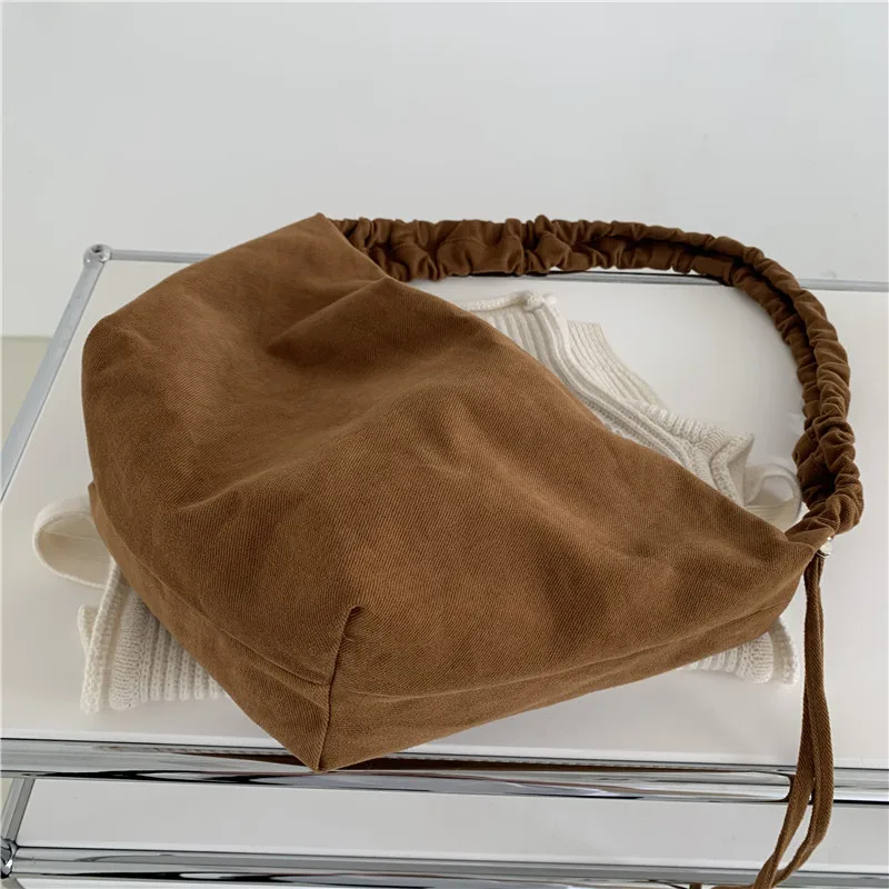 Women's new bag 2021 straddle single shoulder bag dumpling BAG canvas fold drawstring shoulder strap large capacity canvas bag
Women's new bag 2021 straddle single shoulder bag dumpling BAG canvas fold drawstring shoulder strap large capacity canvas bag