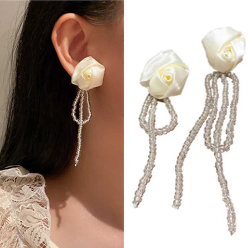 White Rose Flower Rice Bead Tassel Long Earrings French Retro Super Fairy Beautiful Fashion Sweet Flower Women's Earrings
White Rose Flower Rice Bead Tassel Long Earrings French Retro Super Fairy Beautiful Fashion Sweet Flower Women's Earrings