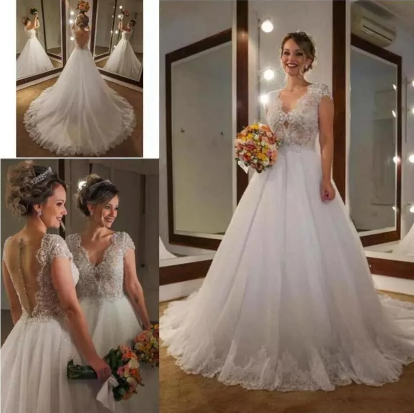 Luxury 2019 Wedding Dresses V Neck Sweep Train Bridal Gowns Lace Appliques Button Back Plus Size A Line Wedding Dress
Luxury 2019 Wedding Dresses V Neck Sweep Train Bridal Gowns Lace Appliques Button Back Plus Size A Line Wedding Dress
