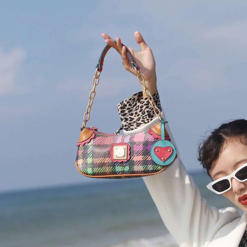 Colorful retro color matching plaid chain creative baguette bag 2021 new trend underarm messenger bag
Colorful retro color matching plaid chain creative baguette bag 2021 new trend underarm messenger bag