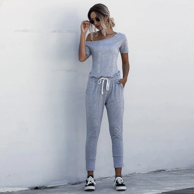 2021 Spring and Summer Hot Sale Off-Shoulder Short-Sleeved Pocket Lace-Up Oblique Shoulder Women Jumpsuit Casual Pants
2021 Spring and Summer Hot Sale Off-Shoulder Short-Sleeved Pocket Lace-Up Oblique Shoulder Women Jumpsuit Casual Pants