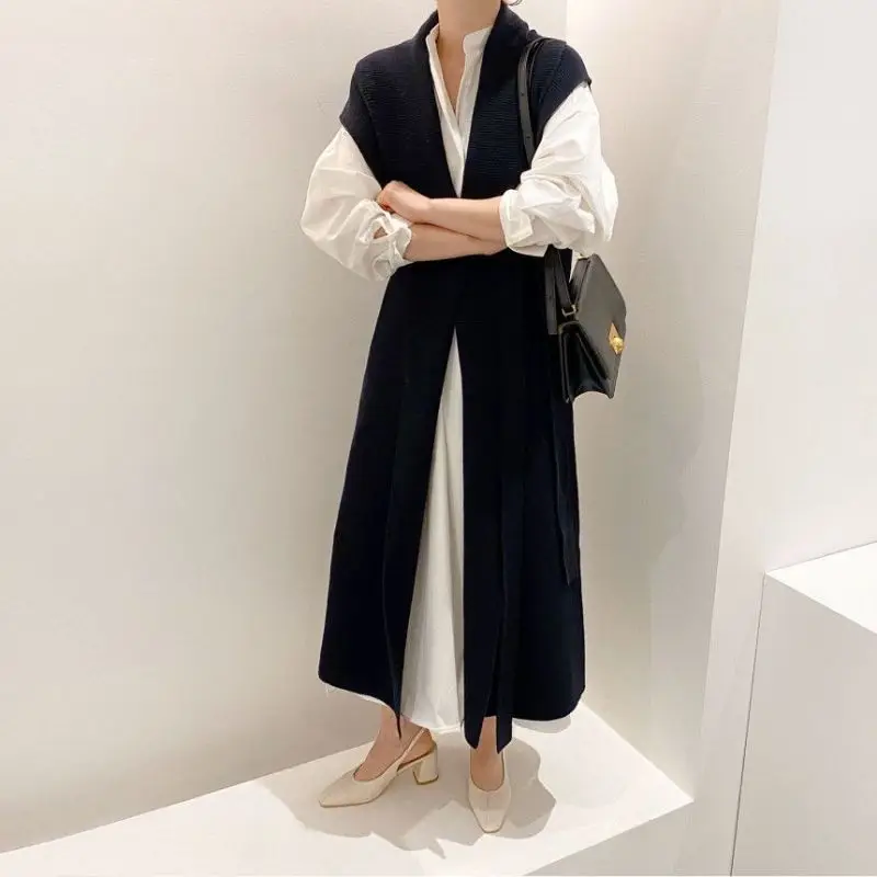2021 Women Autumn Winter Long Sweater Coat Jacket Sashes Sleeveless Knitted Vest Overcoat Coat Casual Cardigan Cloak
2021 Women Autumn Winter Long Sweater Coat Jacket Sashes Sleeveless Knitted Vest Overcoat Coat Casual Cardigan Cloak