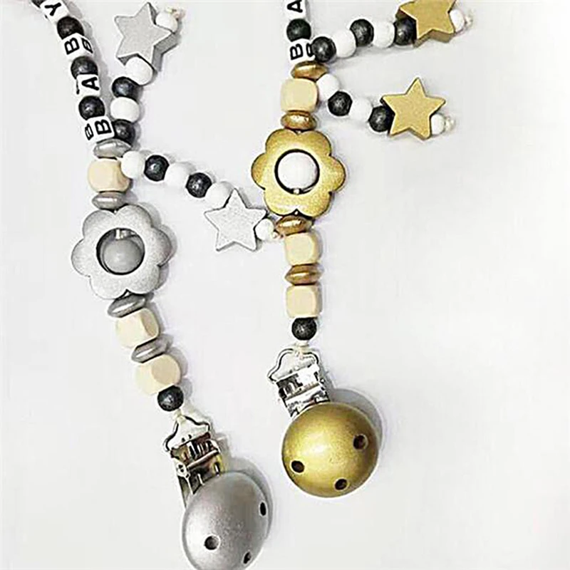 2020 New Teether DIY Anti Chain Baby Wooden Small Beads Letter Pacifier Chain Clip Gold Silver Car Pacifier Chain
2020 New Teether DIY Anti Chain Baby Wooden Small Beads Letter Pacifier Chain Clip Gold Silver Car Pacifier Chain