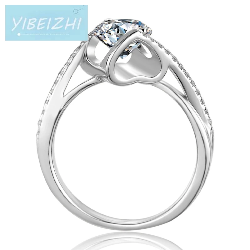 The New 925 silver angel kiss heart moissanite pass ring diamond excellent cut 1ct d moissanites female wedding engagement ring
The New 925 silver angel kiss heart moissanite pass ring diamond excellent cut 1ct d moissanites female wedding engagement ring
