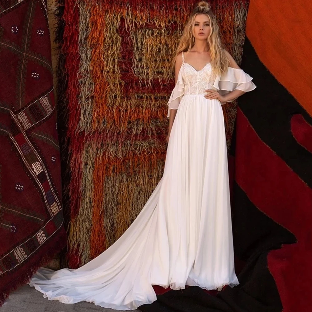 Sexy Cold Off Shoulder Wedding Dress 2021 Beach A Line Chiffon Lace Appliques Short Sleeves Bridal Gowns Boho Sweep Train
Sexy Cold Off Shoulder Wedding Dress 2021 Beach A Line Chiffon Lace Appliques Short Sleeves Bridal Gowns Boho Sweep Train