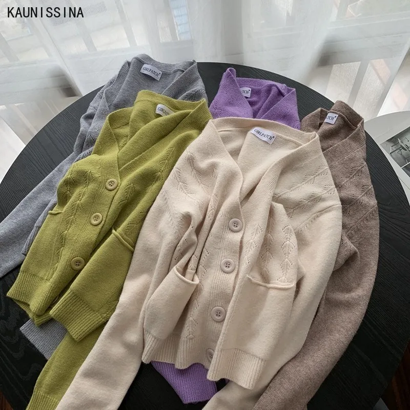Autumn Winter Knitted Sweaters V-neck Loose Knit Cardigan Female Chic Tops Mid-Length Student Lazy Sweater Coat Outwear Tops
Autumn Winter Knitted Sweaters V-neck Loose Knit Cardigan Female Chic Tops Mid-Length Student Lazy Sweater Coat Outwear Tops