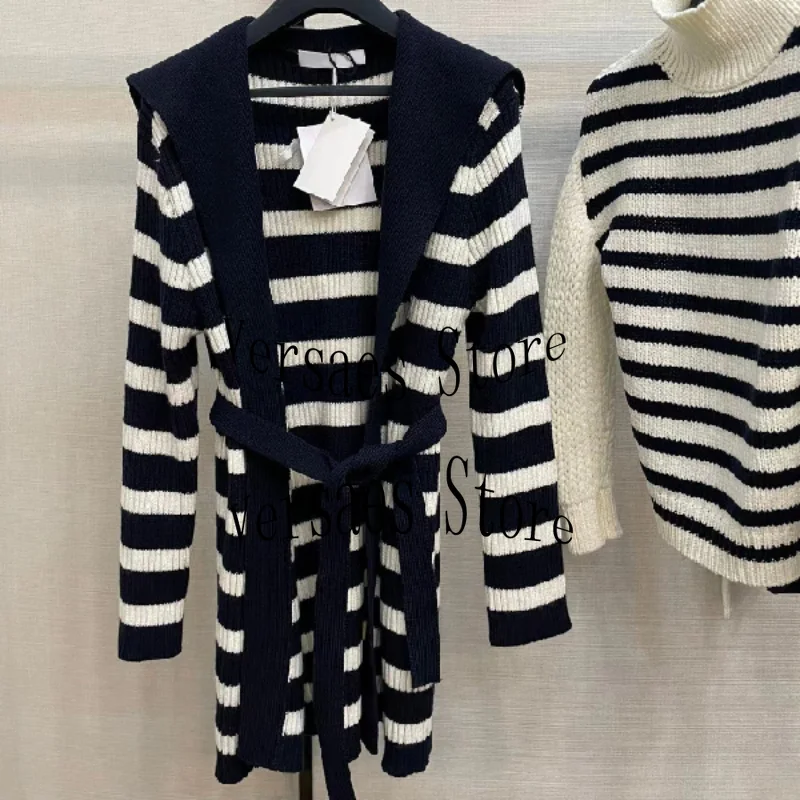 2021 luxury design autumn winter new fashion medium length cardigan with belt, large lapel retro uninhibited women cardigan
2021 luxury design autumn winter new fashion medium length cardigan with belt, large lapel retro uninhibited women cardigan