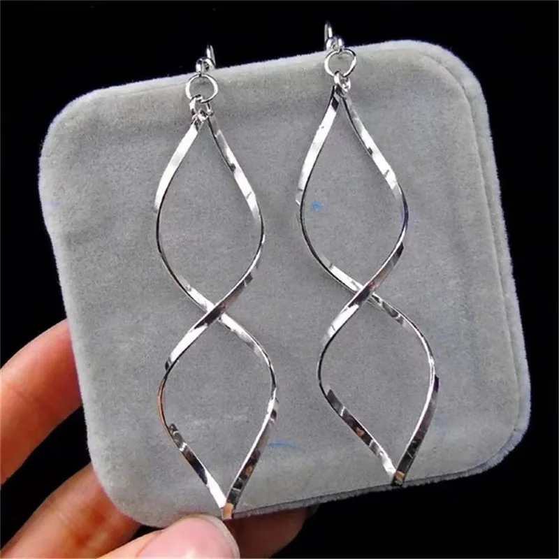 European and American fashion temperament explosion earrings twist 8-character metal creative earrings female c0306
European and American fashion temperament explosion earrings twist 8-character metal creative earrings female c0306