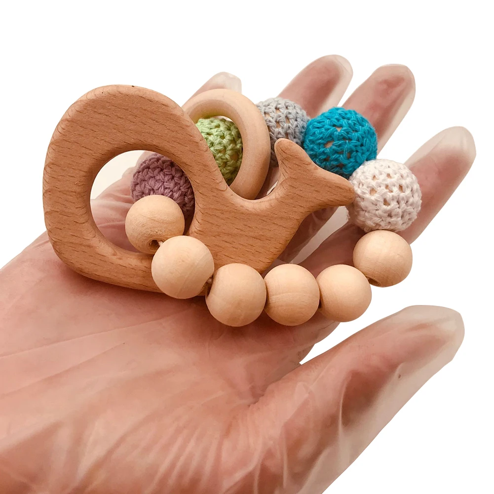 Деревянный Детский браслет для прорезывания зубов, жевательное кольцо, аксессуары для детской коляски, браслет для прорезывания зубов
Деревянный Детский браслет для прорезывания зубов, жевательное кольцо, аксессуары для детской коляски, браслет для прорезывания зубов