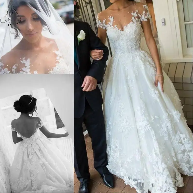 New Arrival A Line Lace Wedding Dresses 2021 robe de mariee Sheer Open Back Wedding Gowns Cap Sleeve Handmade Bridal Dress
New Arrival A Line Lace Wedding Dresses 2021 robe de mariee Sheer Open Back Wedding Gowns Cap Sleeve Handmade Bridal Dress