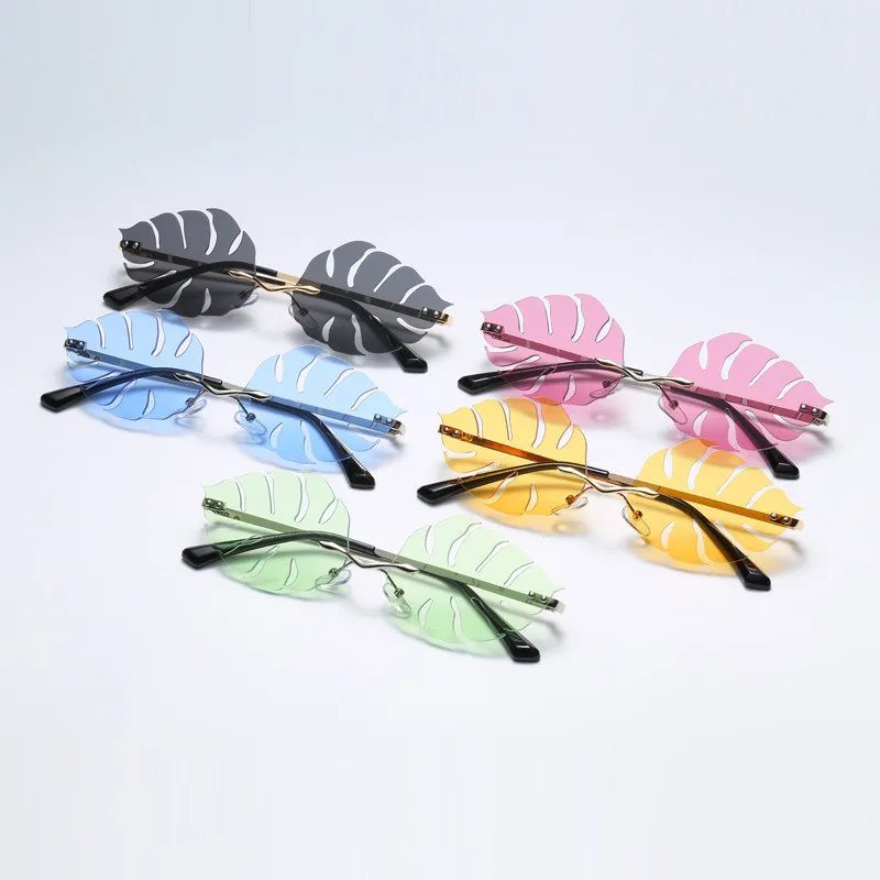 Fashion Frameless Sunglasses Ellipse Men Women Steampunk Metal Golden Black Pink Blue Leaf-shape Rimless Sun glasses
Fashion Frameless Sunglasses Ellipse Men Women Steampunk Metal Golden Black Pink Blue Leaf-shape Rimless Sun glasses