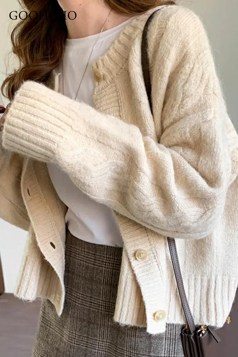Autumn Winter Women's Cardigan Korean Style The Retro Solid Color Ruffled Collar Knitted Cardigan Loose Short Twist Sweater Coat
Autumn Winter Women's Cardigan Korean Style The Retro Solid Color Ruffled Collar Knitted Cardigan Loose Short Twist Sweater Coat