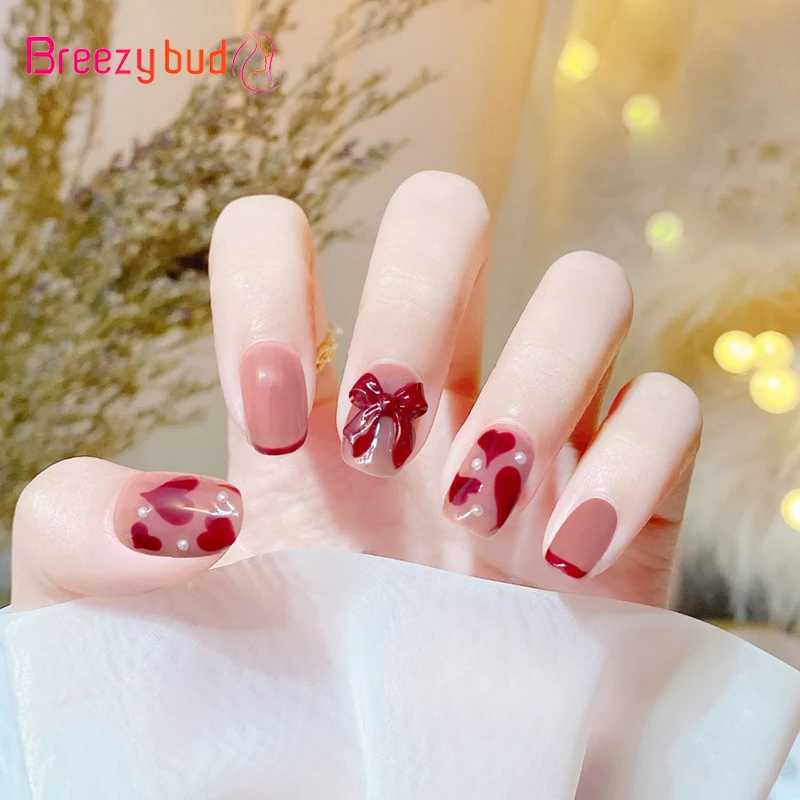 24pcs/Box Short False Nails With Glue 3D Pearl Bowknot Fake Nails Press on Nail Full Cover Nail Tips Fingersnails Decoration
24pcs/Box Short False Nails With Glue 3D Pearl Bowknot Fake Nails Press on Nail Full Cover Nail Tips Fingersnails Decoration