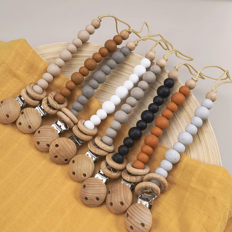 Baby Hot New Product Organic Wooden Pacifier Clip Non-Toxic BPA-Free Portable Baby Silicone Pacifier Chain Quality Gifts
Baby Hot New Product Organic Wooden Pacifier Clip Non-Toxic BPA-Free Portable Baby Silicone Pacifier Chain Quality Gifts
