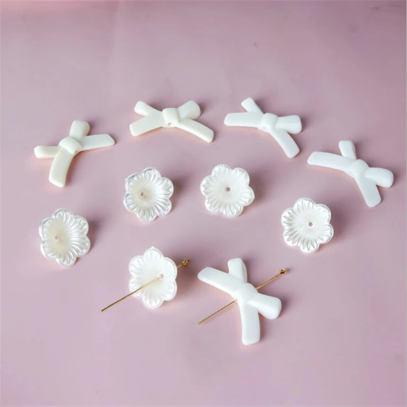 20pcs/lot new imitation pearl knotbow acylic flower beads connectors for diy earrings resin jewelry accessories spacer beads
20pcs/lot new imitation pearl knotbow acylic flower beads connectors for diy earrings resin jewelry accessories spacer beads