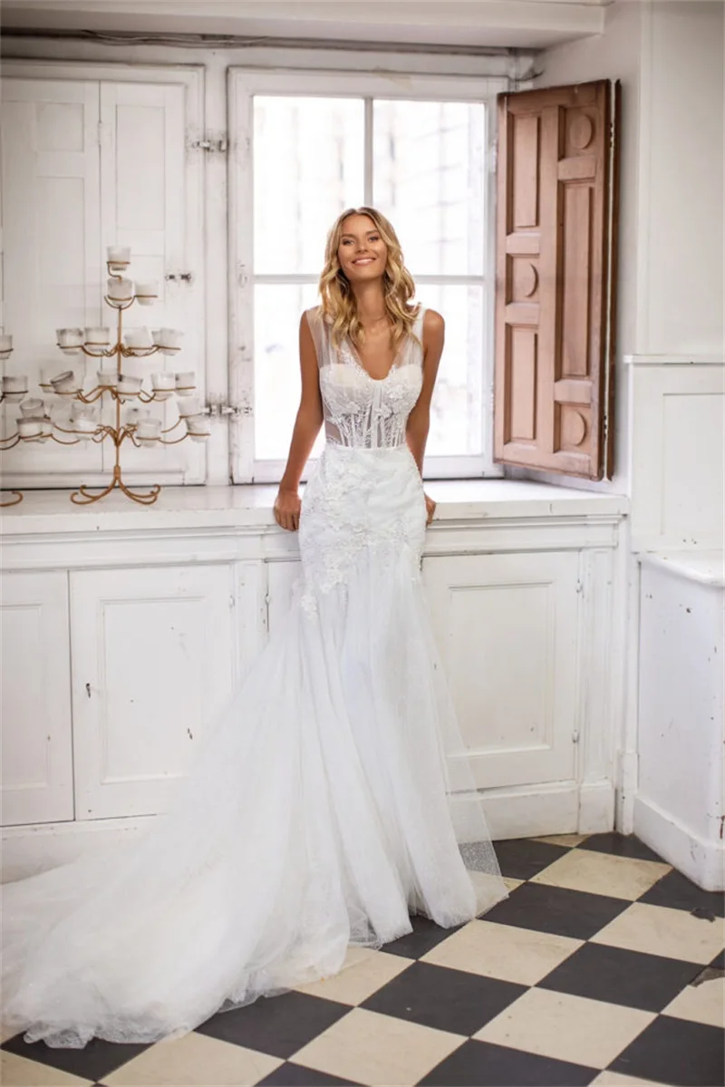 Женское свадебное платье с юбкой-годе, элегантное белое кружевное платье без рукавов, с аппликацией и глубоким V-образным вырезом, свадебное...
Женское свадебное платье с юбкой-годе, элегантное белое кружевное платье без рукавов, с аппликацией и глубоким V-образным вырезом, свадебное...