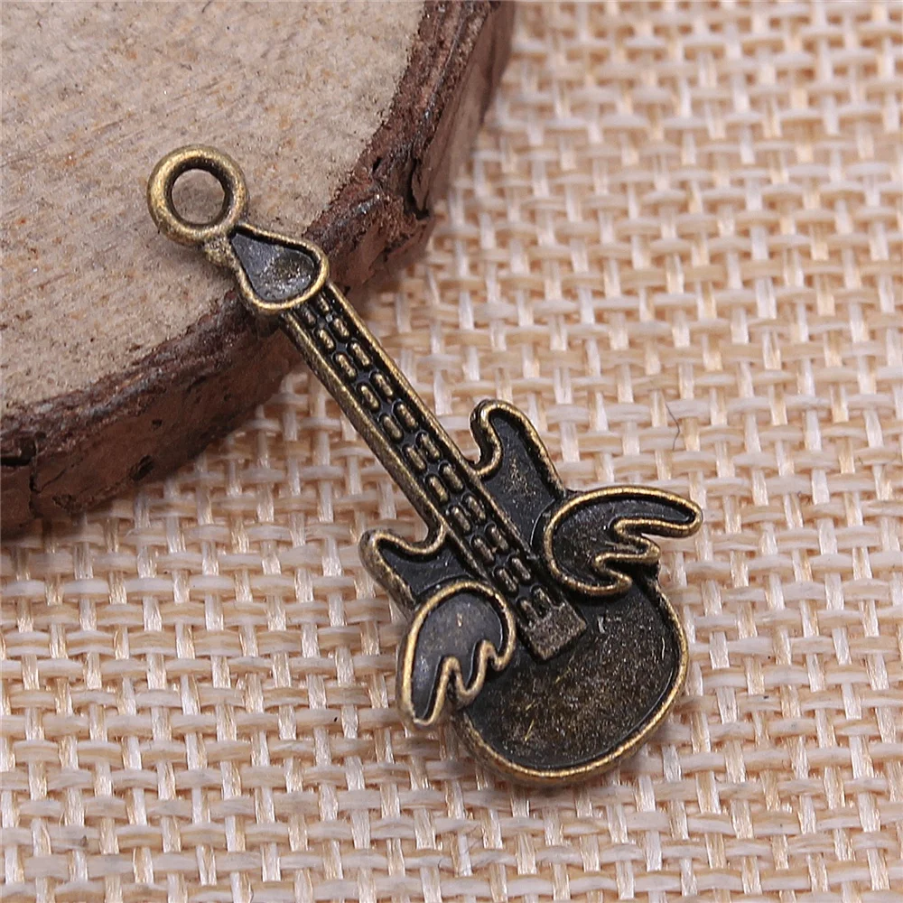 38pcs 31x15mm antique bronze Guitar music dream wings charms diy retro jewelry fit Earring keychain hair card pendant
38pcs 31x15mm antique bronze Guitar music dream wings charms diy retro jewelry fit Earring keychain hair card pendant