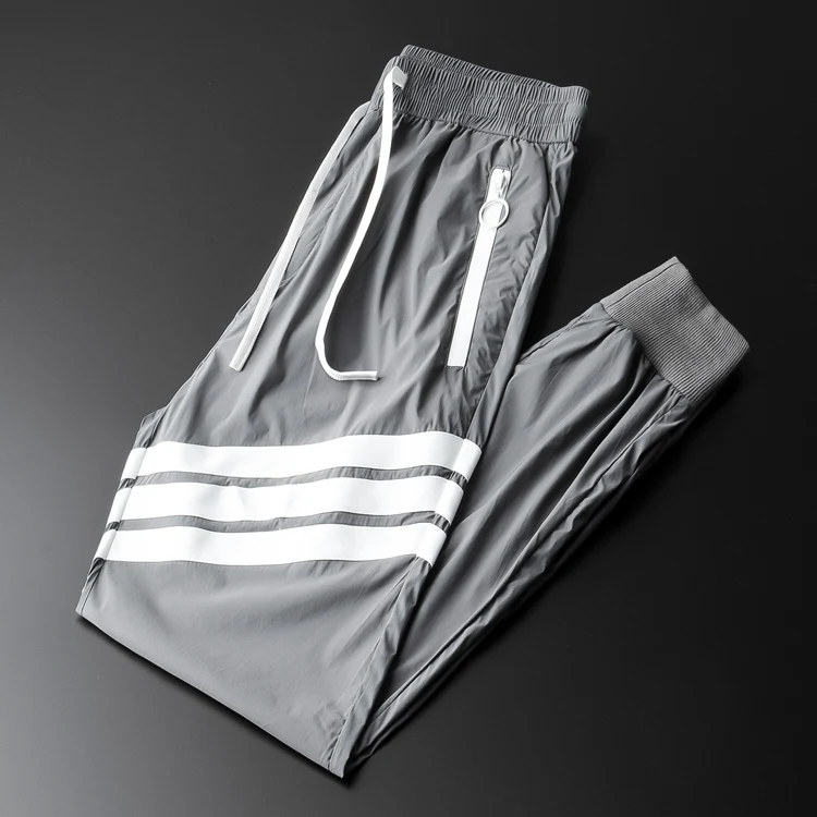 Sports unrestrained high end silk slide fast dry pants men's summer thin fashion contrast casual pants men's Leggings
Sports unrestrained high end silk slide fast dry pants men's summer thin fashion contrast casual pants men's Leggings