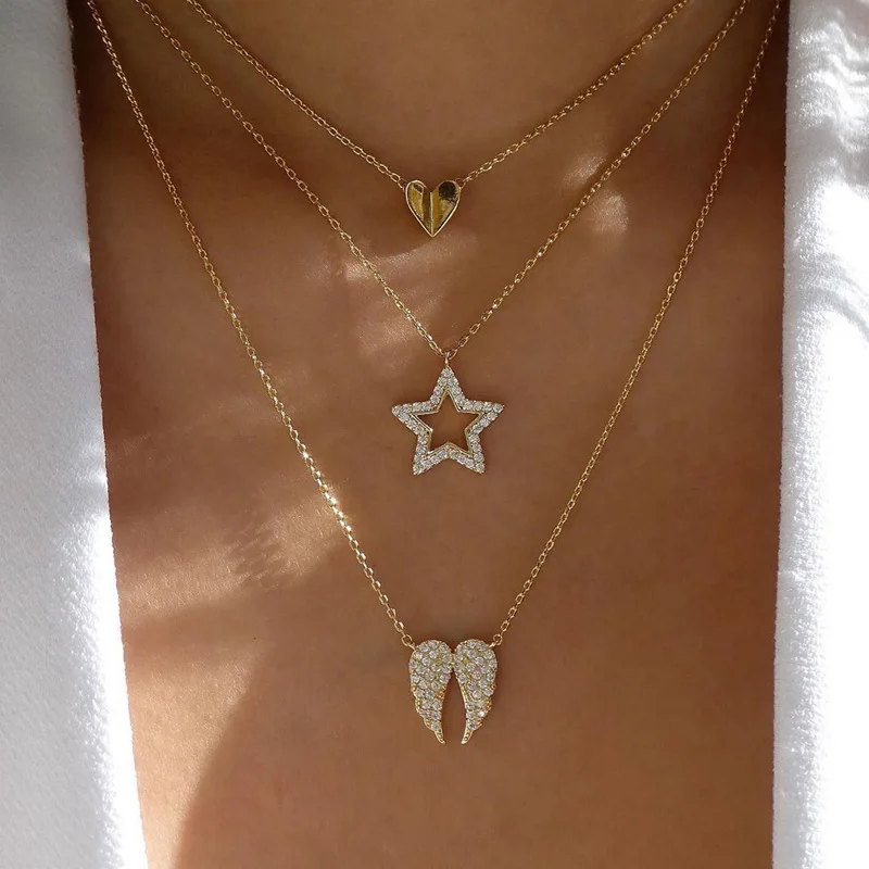 Origin Summer Shining Rhinestone Star Heart Angel Wing Pendant Necklaces for Women Girl Gold Metal 3 Layed Choker Necklace
Origin Summer Shining Rhinestone Star Heart Angel Wing Pendant Necklaces for Women Girl Gold Metal 3 Layed Choker Necklace