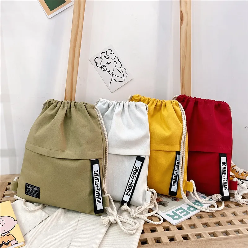 Canvas Backpack Bag Women's Drawstring Laminating Film Mouth Outdoor Sports Leisure Bag Trend Hot Selling Students 
Canvas Backpack Bag Women's Drawstring Laminating Film Mouth Outdoor Sports Leisure Bag Trend Hot Selling Students
