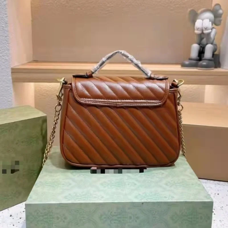 2021 temperament women's bag g new gold brown embroidered thread leather portable fashion women's bag single shoulder bag diagon
2021 temperament women's bag g new gold brown embroidered thread leather portable fashion women's bag single shoulder bag diagon